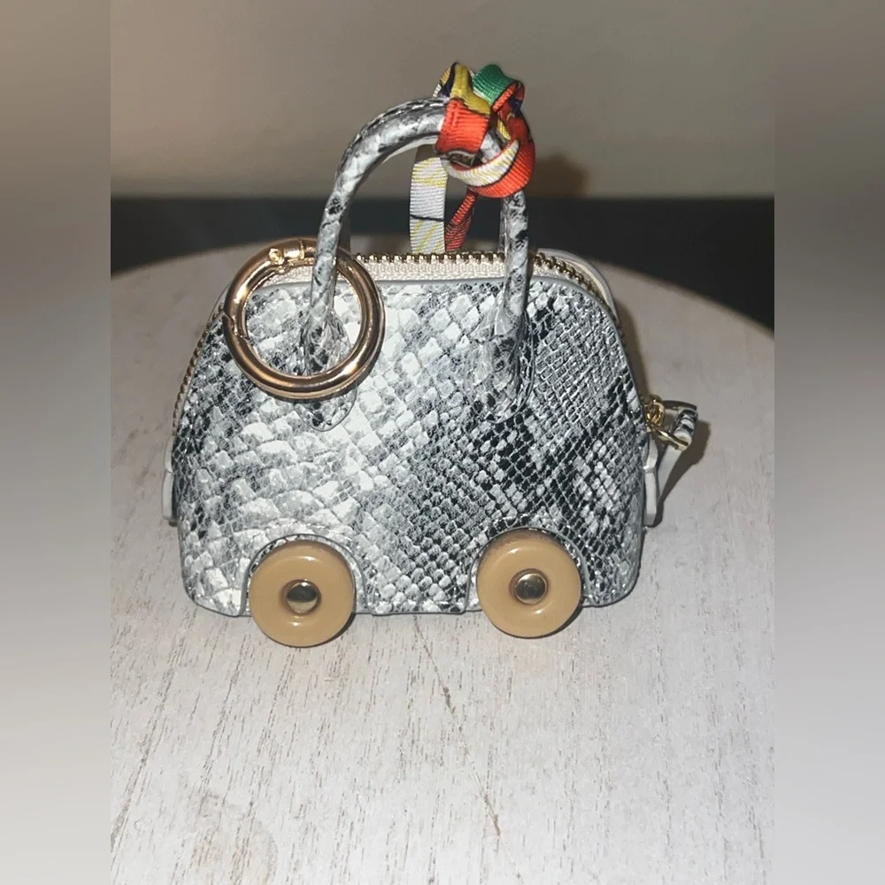 Silver Snake-Print Key & Card Holder with Beige Wheel Accents